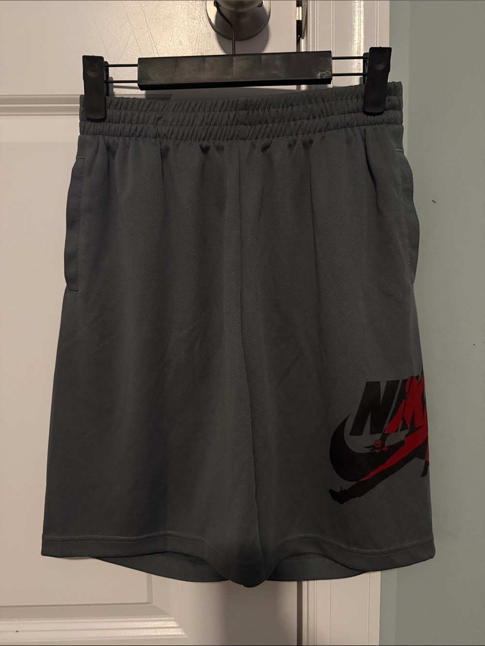 Nike Gray Athletic Shorts with Black and Red Logo